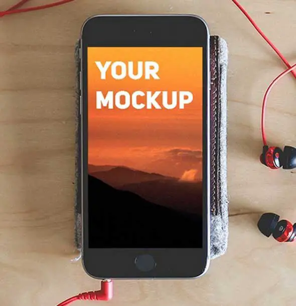 Realistic iPhone 6 with Red Headphones Mockup PSD