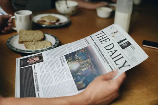 Newspapers Mockups that can be very helpful: Man Reading Newspaper