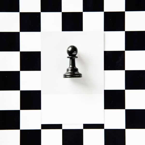 Stunning Free Black and White Stock Photos: Chess Piece on a Pattern
