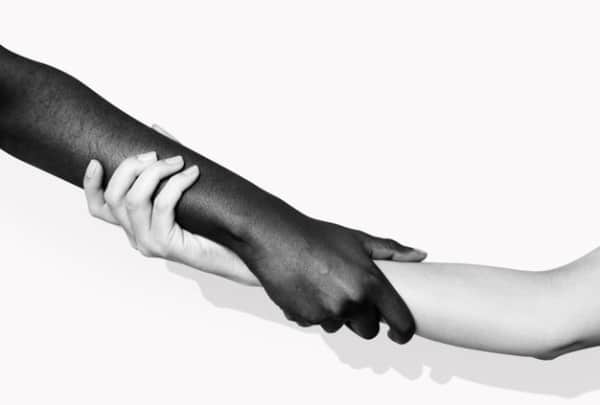 Stunning Free Black and White Stock Photos: Diverse Hands Holding Each Other