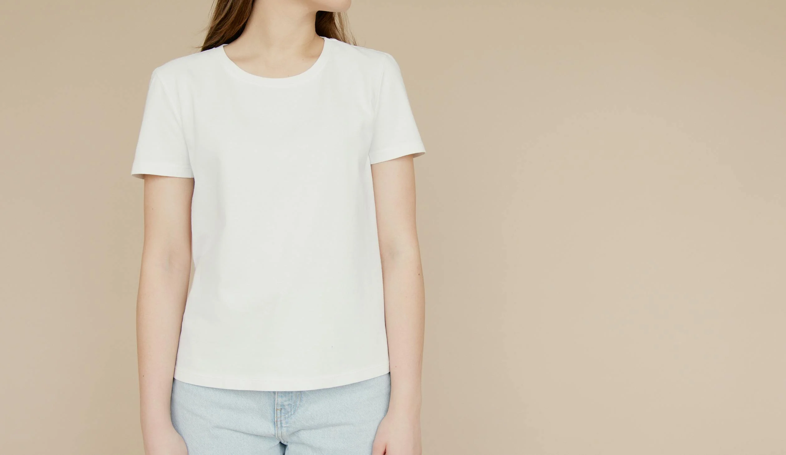 A girl wearing plain white t-shirt